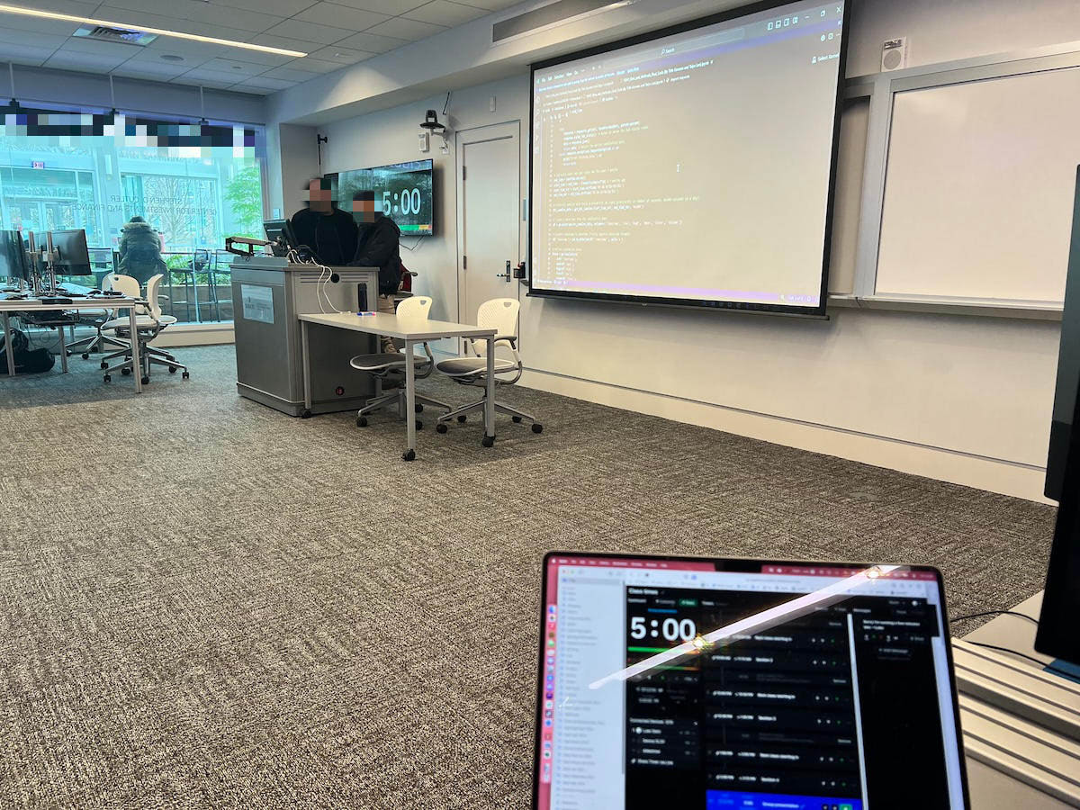 Professor using Stagetimer in university classroom with timer displayed on screen